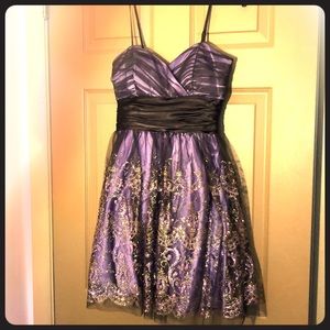 Short homecoming or prom dress.